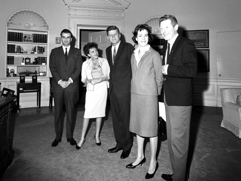 President John F. Kennedy meets with Danny Kaye, Garland, Carol Burnett and Richard Adler at the White House in 1962.