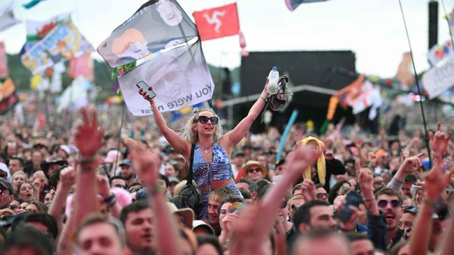 Some of the crowds at England’s Glastonbury music festival in June. New slang terms either bubbling up before evaporating, or coalescing into something that circulates among niche groups siloed away in different corners of the internet. Picture: Oli Scarff / AFP