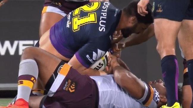 Thaiday grabs at Bromwich's injured hand