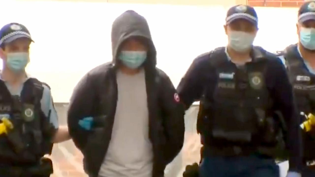 Yang Zhao under arrest in Sydney. Picture: 9News