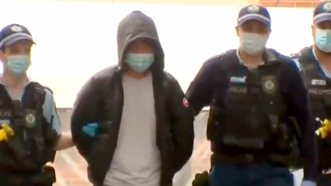 Yang Zhao under arrest in Sydney. Picture: 9News