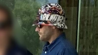 Kent Matthew Roland Cheney avoids the camera in glasses and a hat as he leaves Coffs Harbour courthouse on January 24.