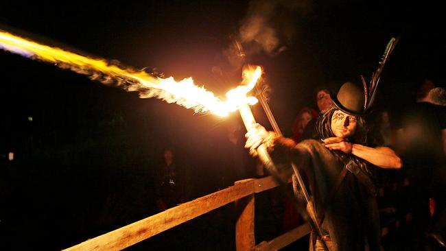 2016 Huon Valley Mid-Winter Festival. archer Dan Hennesy of Port Huon fires a flaming arrow into the Burning Man. Picture: SAM ROSEWARNE