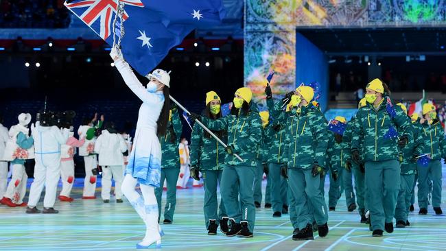 Laura Peel carries the Australian flag during the opening ceremony of the Beijing 2022 Winter Olympics. Picture: Getty Images