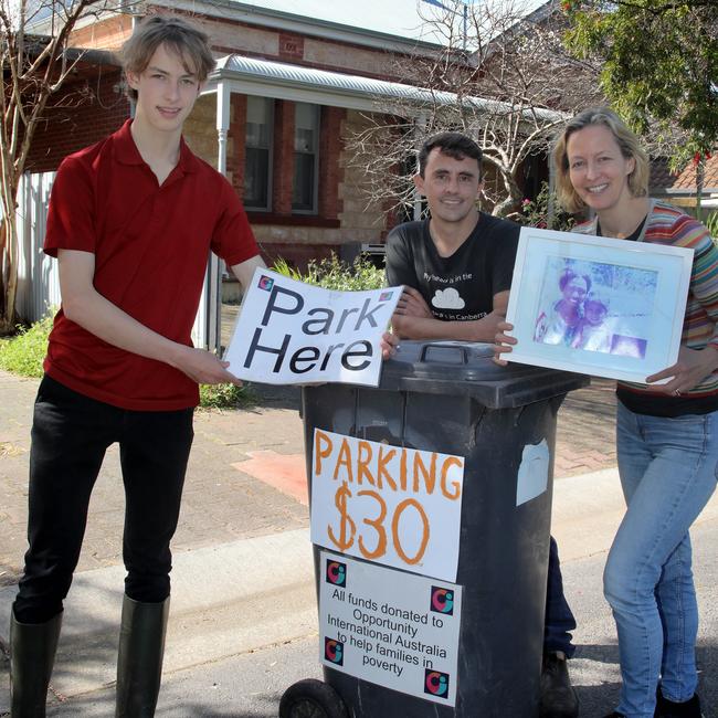 David and Anthony Perry and Kirsty Munro offer parking space at their home near the Showgrounds to raise money for a charity. Picture: Dean Martin