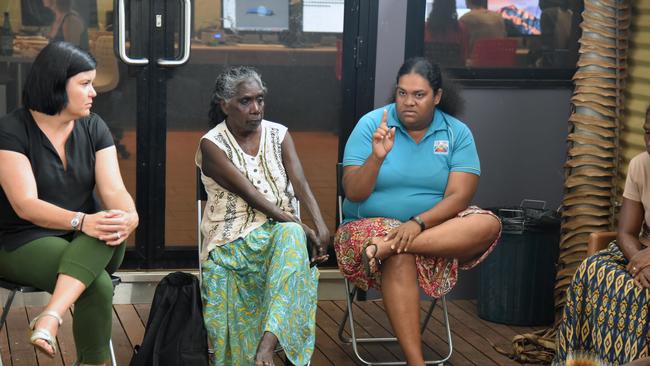 Chief Minister Natasha Fyles, the then-Northern Territory Health Minister (left) and Miwatj Health worker Melanie Rarrtjiwuy Herdman (centre) attend a Nhulunbuy community meeting in Arnhem Land in July, 2017. Nhulunbuy was the trial site of the Gunner government’s Banned Drinker Register, a $17 million measure tackling alcohol abuse, that was rolled out Territory-wide in September that year. Picture: Lucy Hughes Jones/AAP