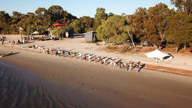 Residents gather on the beach at Couran Cove Island Resort, South Stradbroke Island. Picture: supplied