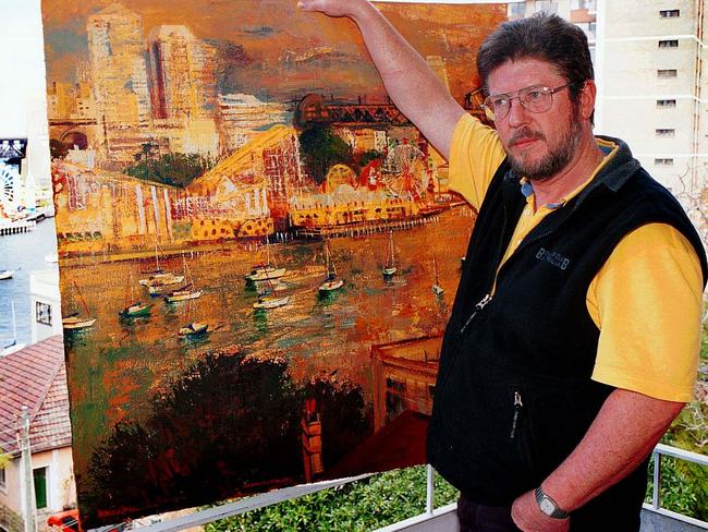 Artist Patrick Carroll with one of his works in August 2002. Picture: Virginia Young