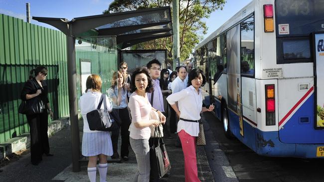 Bus passengers at Green Square. The changes are largely to accommodate Green Square passengers. (Photo by Phil Rogers)