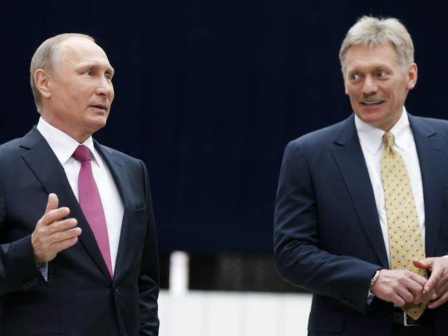 Mr Putin and Mr Peskov. Picture: AP