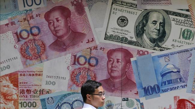 China’s offshore currency fell to lowest level against the US dollar since 2010. Picture: AP