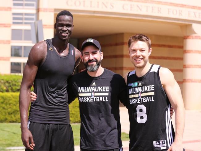 Milwaukee Bucks' head of physical therapy Adelaide-born Tim O'Leary with Aussie players Thon Maker (left) and Matthew Dellavedova (right).