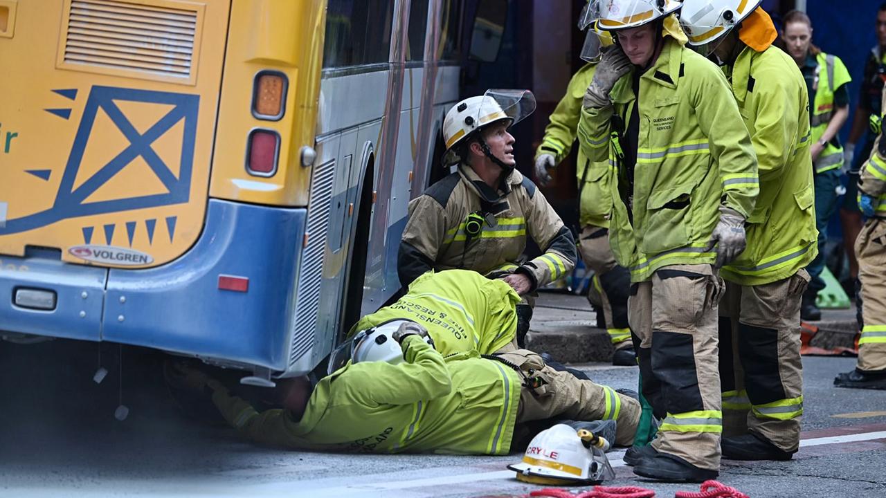 A bus has mounted the footpath during peak hour in the Brisbane CBD hitting a group of pedestrians on Edward St. Photo: Lyndon Mechielsen.