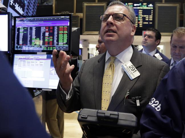 Trader Mathias Roberts works on the floor of the New York Stock Exchange, Wednesday, June 10, 2015. U.S. stocks are opening higher, breaking a weeklong slump. (AP Photo/Richard Drew)