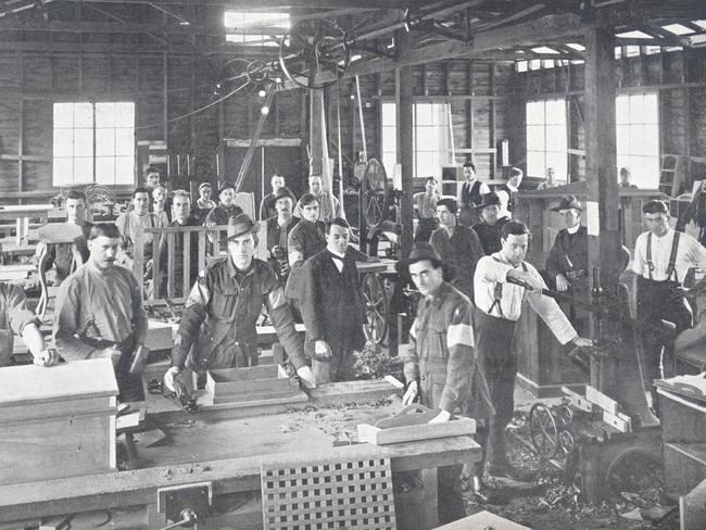 These men made it home ... but not all their comrades’ stories were known. Wounded diggers learning new skills in a Red Cross workshop after returning from the front line in World War One.