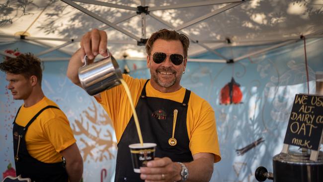 A man pouring a coffee at the Byron Community Market last year. Picture: Kurt Petersen