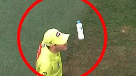 Goal Umpire Steven Piperno hit in the head by a water bottle. Picture: Fox Sports