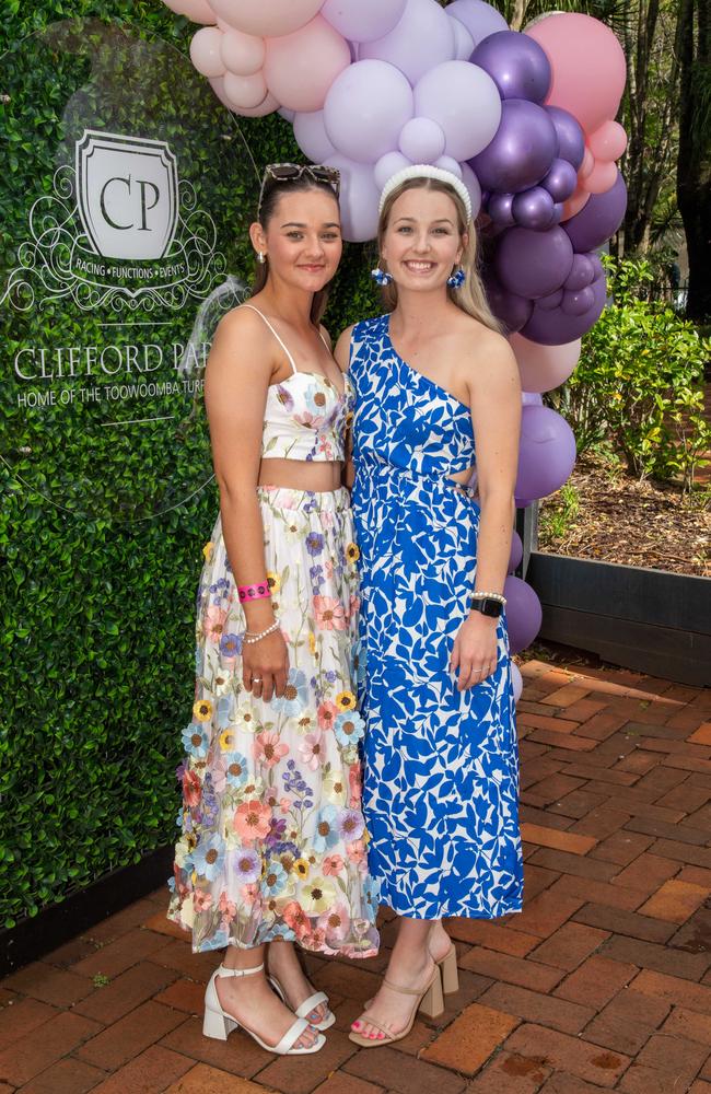 (From left) Sophie Huggins and Hayley Goltz. Weetwood Raceday at Toowoomba Turf Club. Saturday, September 28, 2024. Picture: Nev Madsen.