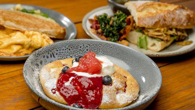 The new menu features Saag Aloo Hash, Raspberry and Ricotta Souffle Pancakes and Star Anise Slow Braised Beef Baguette dish. Picture: Jerad Williams