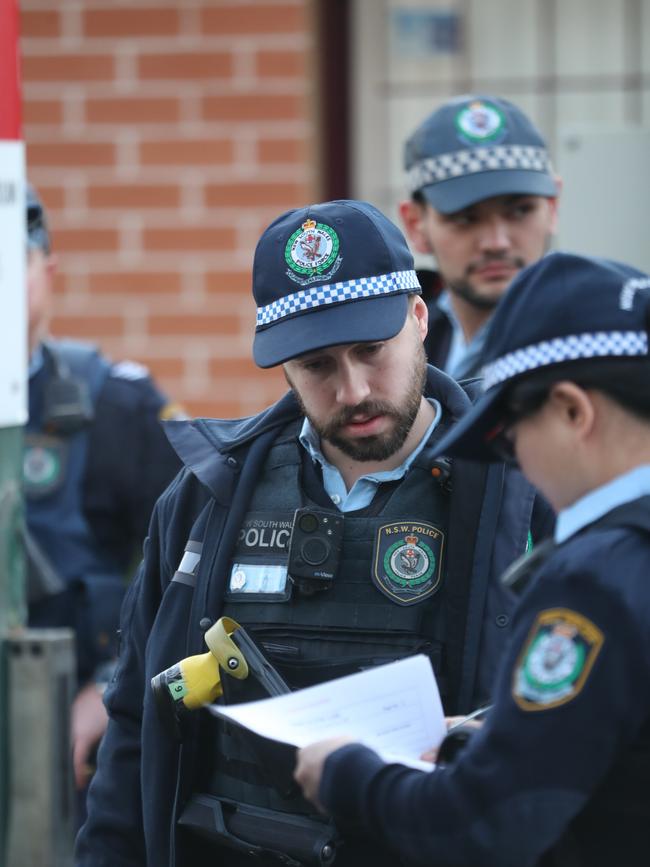 Police oversee evacuation. Pictures: John Grainger