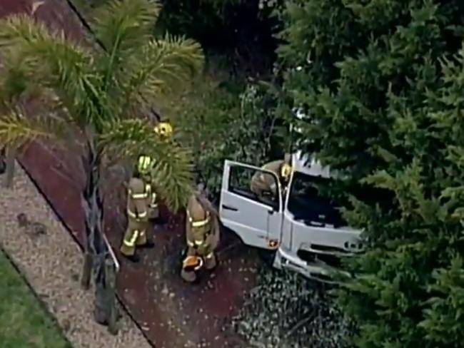 Emergency workers at the scene of the Donvale fatality. Images: Nine news