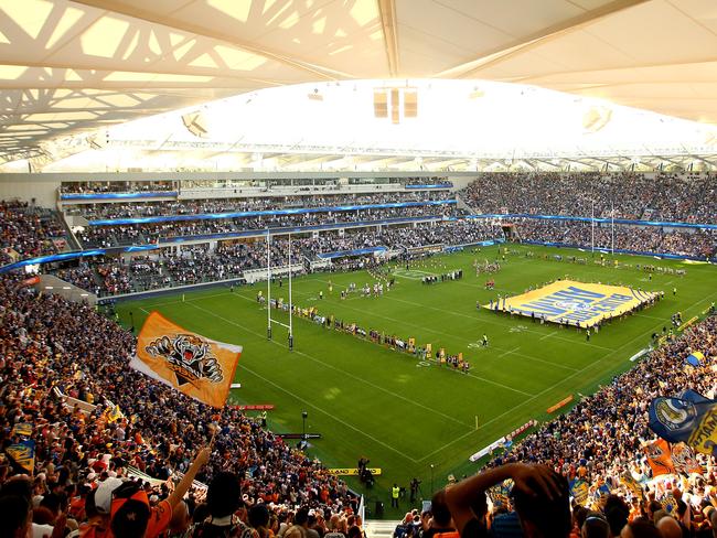 SYDNEY, AUSTRALIA - APRIL 22: Eels and Tigers player sing the national anthem before the round 6 NRL match between the Parramatta Eels and Wests Tigers at Bankwest Stadium on April 22, 2019 in Sydney, Australia. (Photo by Matt Blyth/Getty Images)