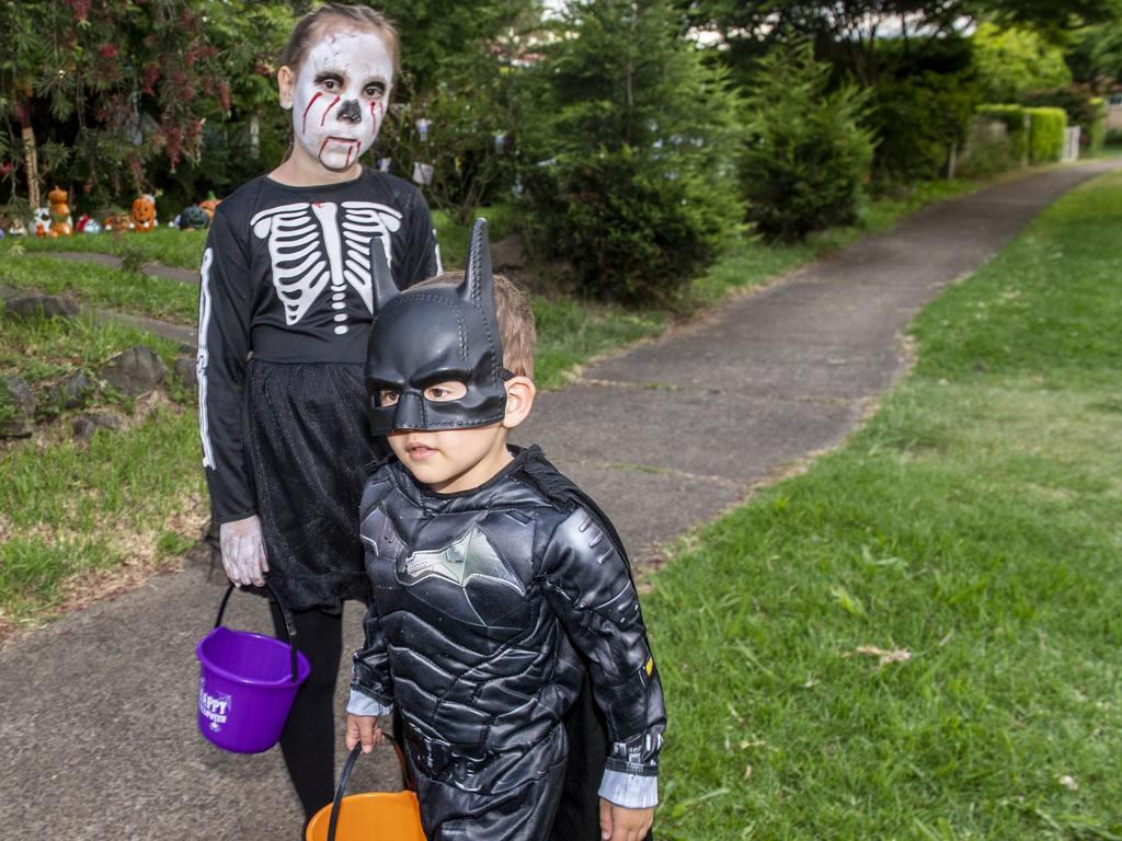 Elaina Matthews and Ethan Witty visit the Halloween display of Tiffany Crosbie. Monday, October 31, 2022. Picture: Nev Madsen.