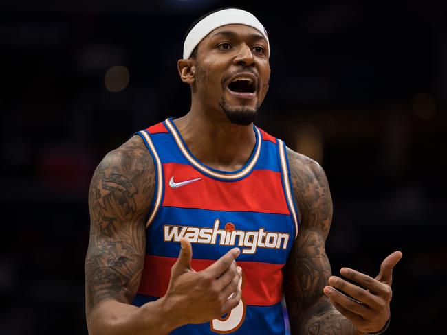 WASHINGTON, DC - JANUARY 21: Bradley Beal #3 of the Washington Wizards reacts to a play against the Toronto Raptors during the first half at Capital One Arena on January 21, 2022 in Washington, DC. NOTE TO USER: User expressly acknowledges and agrees that, by downloading and or using this photograph, User is consenting to the terms and conditions of the Getty Images License Agreement. (Photo by Scott Taetsch/Getty Images)