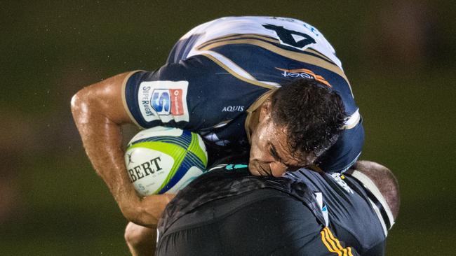 Brumbies lock Rory Arnold is tackled by a Chiefs player on the Sunshine Coast. Photo: RUGBY.com.au/Stuart Walmsley