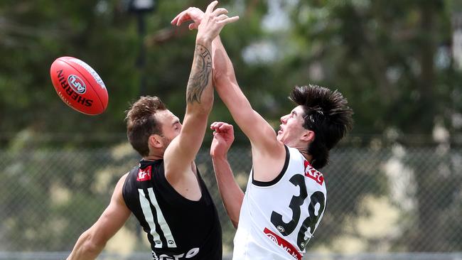 Dante Visentini flies against Jeremy Finlayson during a pre-season trial. Picture: Sarah Reed.