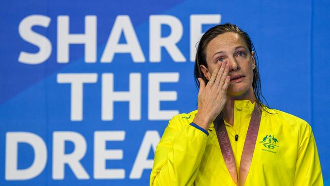 Cate Campbell sheds tears on the dais after winning the women's 50m freestyle final. Picture: Anthony Wallace