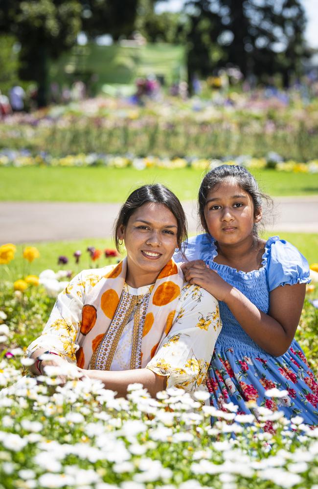 Brisbane visitors Shahrima Tasnin and daughter Sabirah Tasneem in Queens Park for the last day of the Carnival of Flowers, Monday, October 7, 2024. Picture: Kevin Farmer