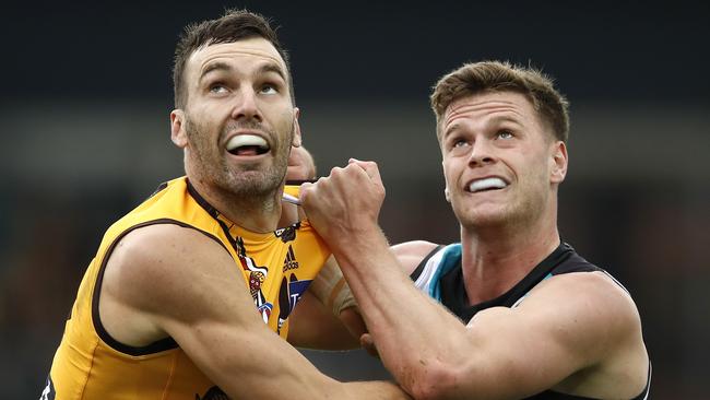 Peter Ladhams, right, rucks against Hawthorn’s Jonathon Ceglar in Round 10. Picture: Dylan Burns/AFL Photos