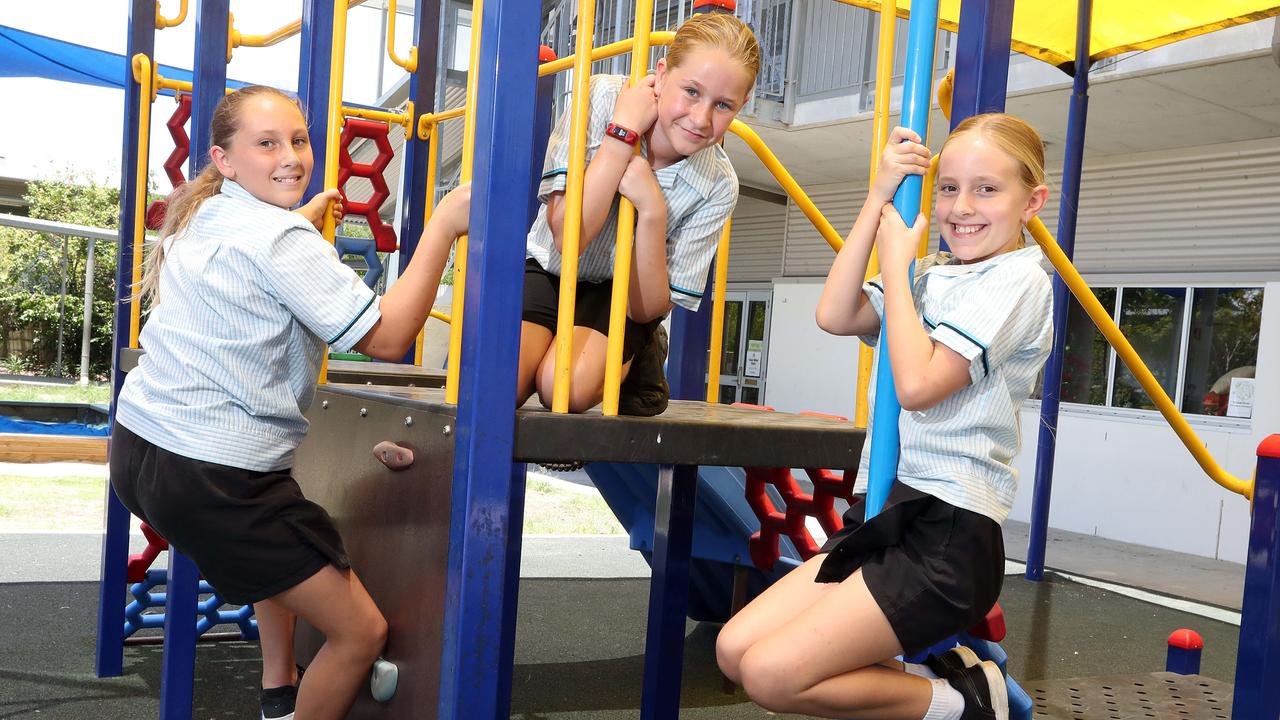 Kayla, Bailey and Sophie, who are students at Park Lake State School, which has Australia's first ever playground made from recycled beauty products. Picture: Richard Gosling