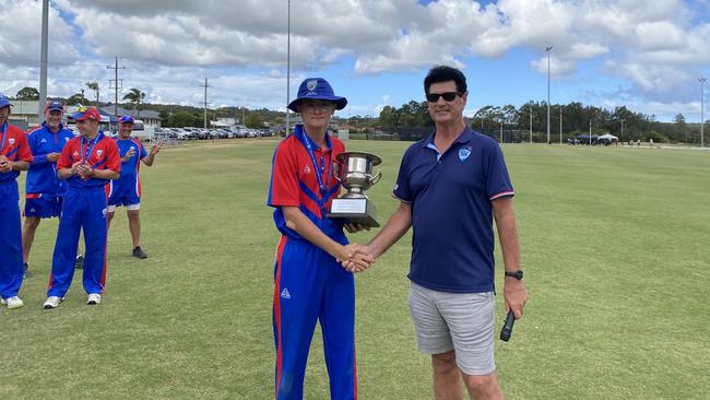 Newcastle Bradman Cup captain Harry Campbell with the Bradman Cup, and NSW Country Cricket chairman Paul Marjoribanks. Photo: Alex Pichaloff.