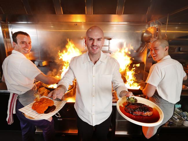 Lagoon Dining’s Ned Trumble, Chris Lerch and Keat Lee cooking up a storm in the kitchen. Picture: David Caird