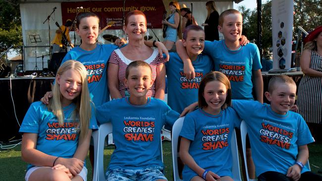 Fairfield Primary School students celebrating World's Greatest Shave. Top left to right: Sam Rippon, Michele Fraser (teacher), Toby Hopkins and Michael Kloss. Bottom left to right: Rata Barrington, Jack Ison (team leader), Pippa Kluge and Hudson Price.