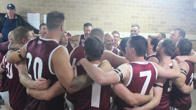 Nullawil belt out the team song after their first win in the North Central Football League. Picture: Wendy Watts.