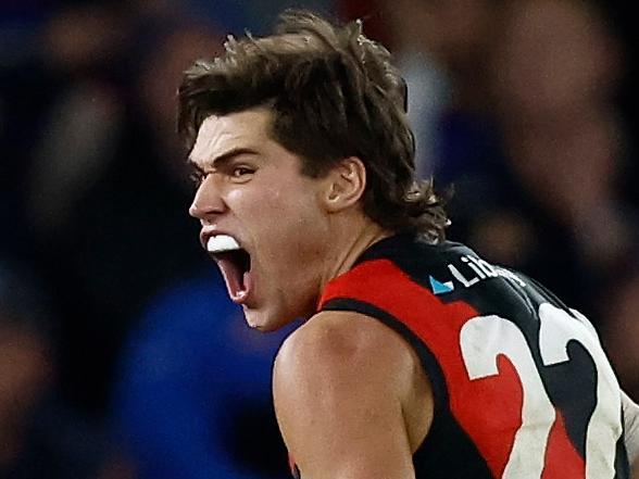 MELBOURNE, AUSTRALIA - APRIL 12: Sam Durham of the Bombers celebrates a goal during the 2024 AFL Round 05 match between the Western Bulldogs and the Essendon Bombers at Marvel Stadium on April 12, 2024 in Melbourne, Australia. (Photo by Michael Willson/AFL Photos via Getty Images)