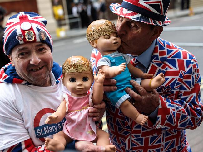 Royal fans John Loughrey (L) and Terry Hutt (R) pose with baby dolls outside the Lindo Wing of St Mary's Hospital. Picture: Jack Taylor/Getty Images.