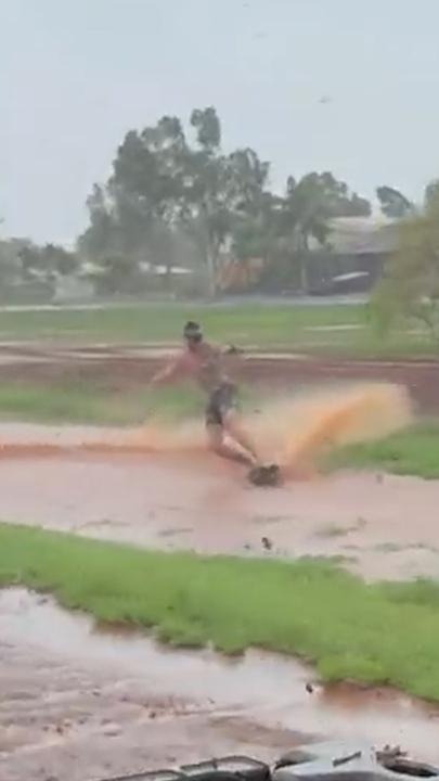 Daredevil wakeboards through flooded storm drains