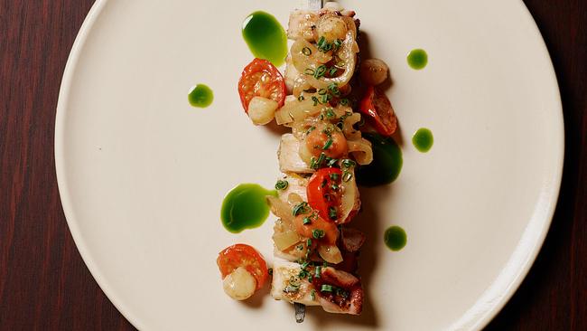 Mid Air at Melbourne Place restaurant review. Squid skewer. Picture: Supplied.