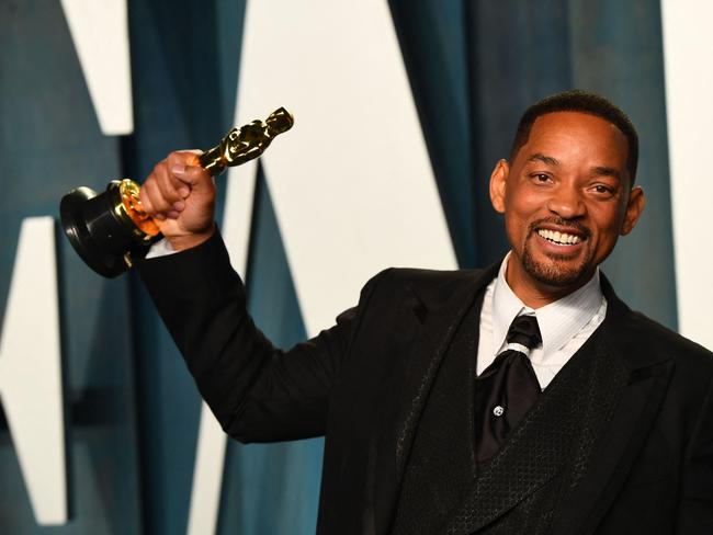 US actor Will Smith holds his award for Best Actor in a Leading Role for King Richard. Picture: AFP.