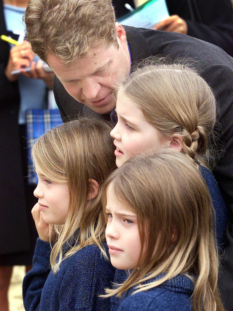 The trio as children circa 2000 with their father, Earl Spencer. Picture: JONATHAN UTZ / AFP