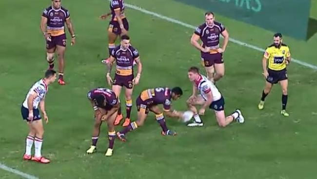 Anthony Milford throws a ball into Dylan Napa.