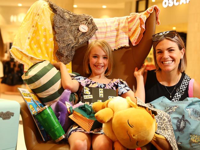 Eight year old Remy on a shopping  spree at the Boxing Day sales in Westfield with her mum Tani Jacobi. Picture: Alison Wynd