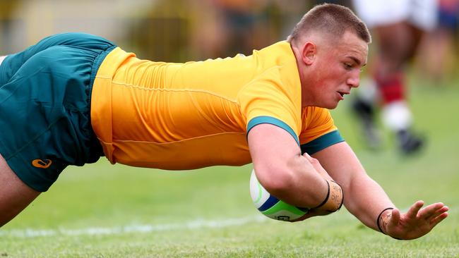 HAMILTON, NEW ZEALAND - OCTOBER 02: Kingsley Uys of Australia U18 scores a try during the match between Australia U8s and  New Zealand Barbarians at St Paul's Collegiate School, on October 02, 2024 in Hamilton, New Zealand. (Photo by Phil Walter/Getty Images for Rugby Australia)