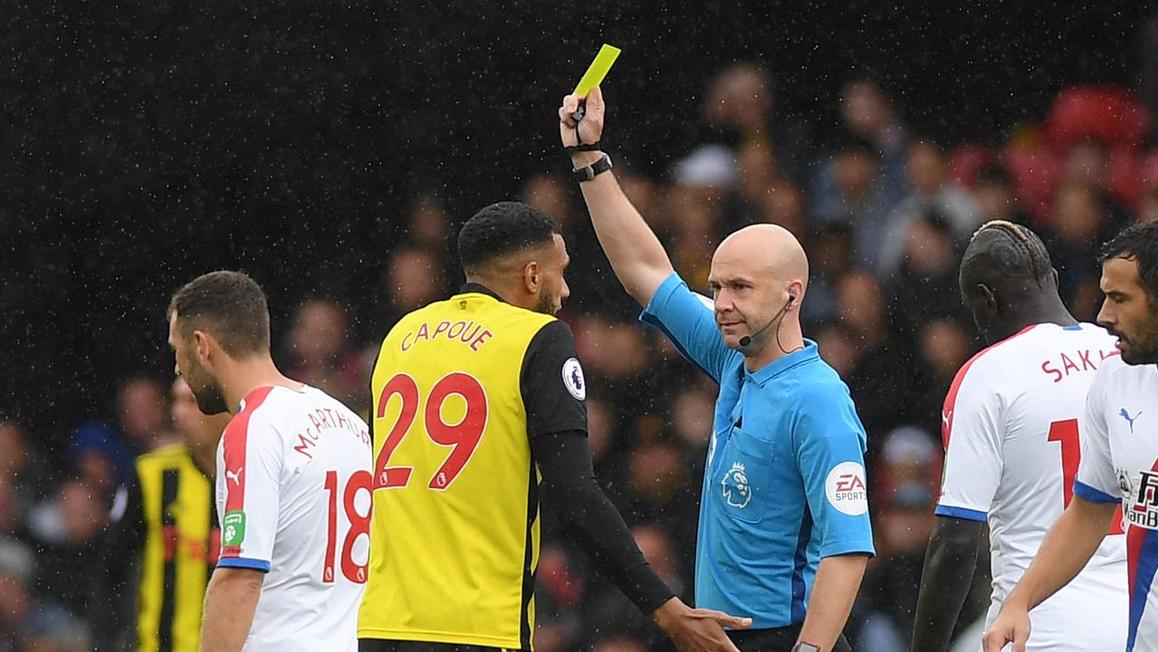 Etienne Capoue avoided seeing a red card for a terrible tackle on Wilfried Zaha.