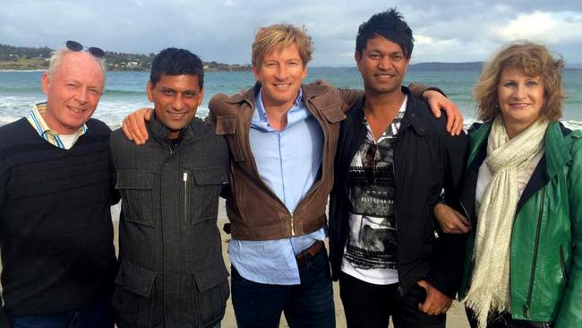 Saroo’s adoptive father John Brierley and his brother Mantosh with cast member David Wenham, Saroo and his adoptive mother Sue Brierley at Primrose Sands Beach.