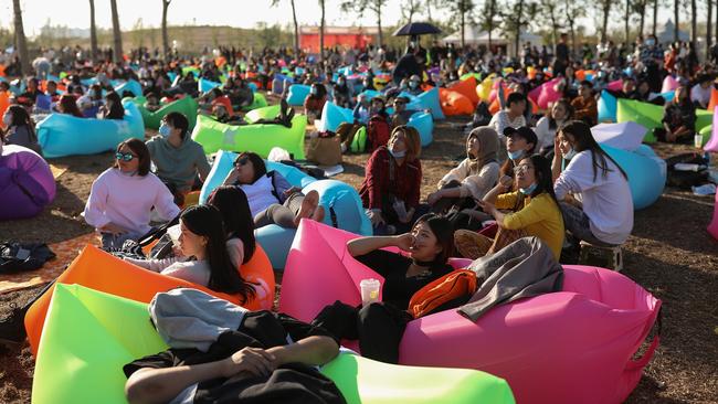 Chinese rock fans watch a band perform at the RYE Music Festival in Beijing. Picture: Getty Images